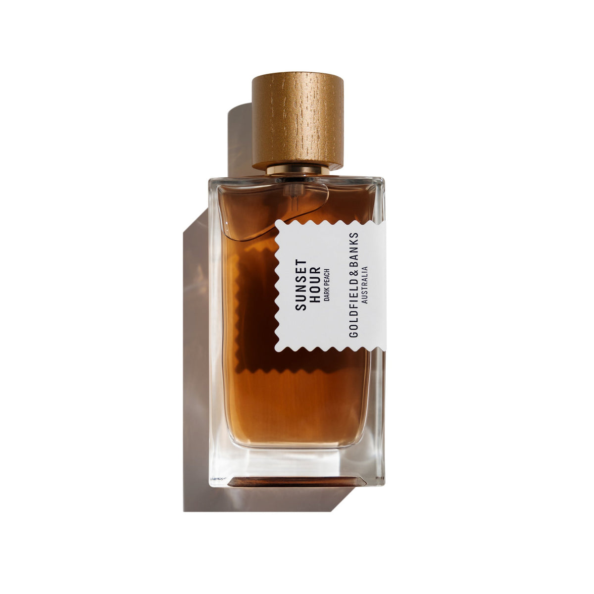 Flacon 100 ml de Sunset Hour Dark Peach, eau de parfum ambrée fruitée et gourmande de Goldfield & Banks, parfumerie Rivora à Nancy