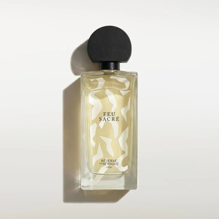 Flacon de Feu Sacré, eau de parfum ambrée boisée résineuse de Réserve en Afrique, parfumerie Rivora à Nancy