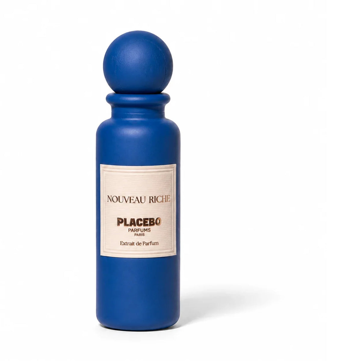 Flacon de Nouveau Riche, extrait de parfum ambré aromatique et gourmand de Placebo Parfums, parfumerie Rivora à Nancy